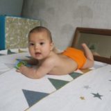bébé avec couche lavable Hamac Orange